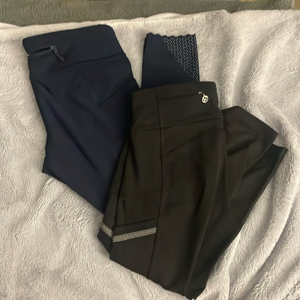 Two pair Lululemon cropped leggings size 6 black and blue